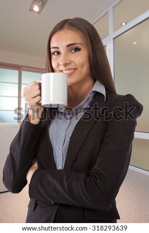 Beautiful young businesswoman portrait in office