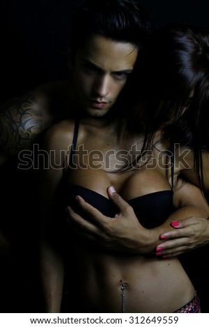evil man making love to a woman