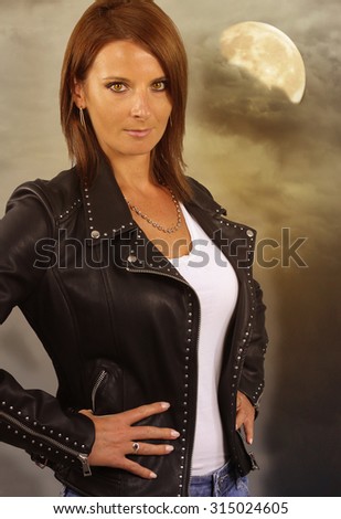 young werewolf - beautiful woman wearing a leather jacket
