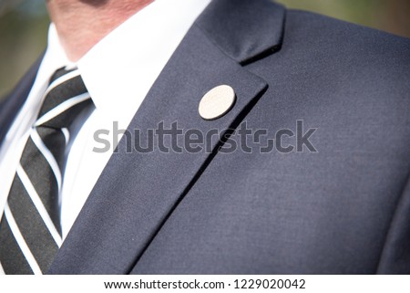 Mens suit Lapel pin closeup of tailored business suit and tie corporate meeting ストックフォト © 