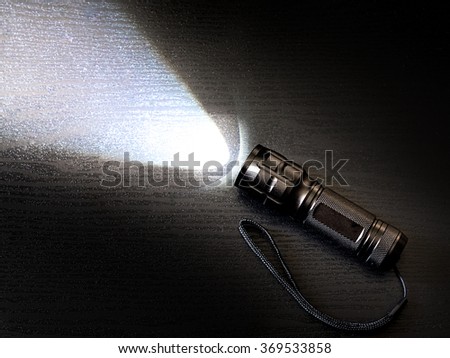 Black Torch Or Flashlight With Beam Of Light. Stock Photo 369533858 ...