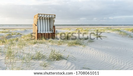 Similar – Image, Stock Photo North sea beach with marram grass. Sylt island beach landscape