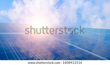 Similar – Image, Stock Photo Selective focus on solar panels or photovoltaic module. Solar power for green energy. Sustainable resources. Solar cell panels use sun light as a source to generate electricity. Photovoltaics or PV.