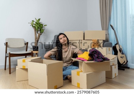 Similar – Image, Stock Photo Thoughtful woman next to old wooden construction