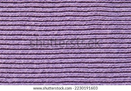 Similar – Image, Stock Photo Close-up of a knitted piece with wooden knitting needles and ball of wool