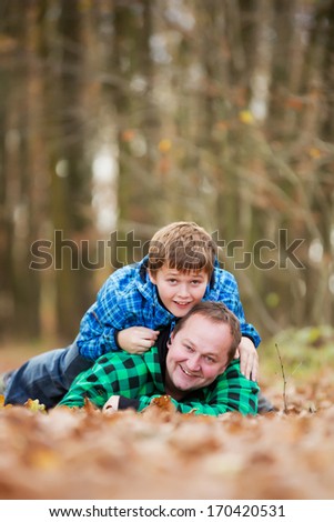 Father and son having fun outdoor