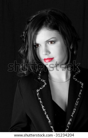 a mystic young woman on black - black and white portrait with red lips