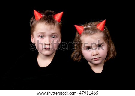 two little devils with red horns
