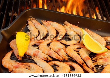 Grilled Shrimps on open BBQ fire. You can see more BBQ, flames and fire on my page.