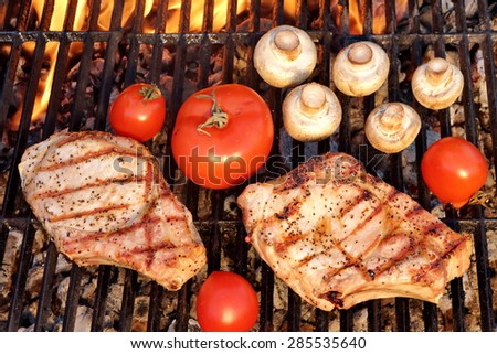 BBQ Pork Rib Pepper Steak, Tomato And Mushrooms On The Hot Flaming Charcoal Grill Overhead View