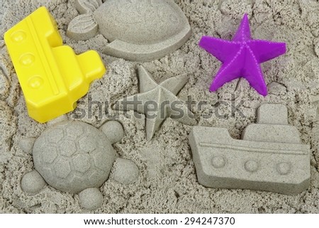 Molds,Beach  White, Sand And Toys. Outdoor Play Game Scene Close-up