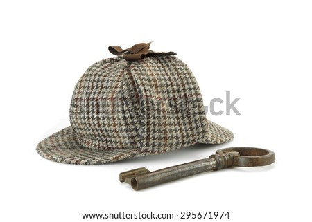 Sherlock Holmes Deerstalker Cap And Old Vintage Big Key Isolated On White Background. Investigation Or Solve Crimes Concept