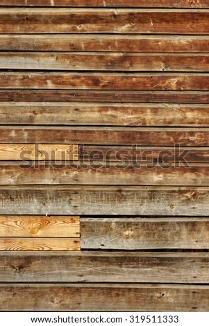 Weathered Old Natural Wood Siding Panel With Handwritten Vandal Signs Background Texture