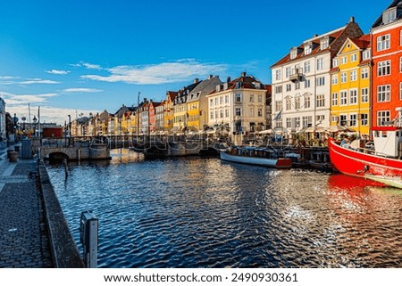 Similar – Foto Bild Kopenhagen liegt am Wasser und hat so viele Abschnitte an der Hafenfront. Eine Stadt, die von Wasser umgeben ist, Kopenhagen ist eine Freude für Schwimmer. Dieses Bild ist auch eine Freude für sexy Booties und lange Beine Liebhaber.