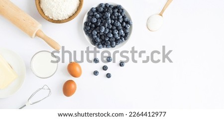 Similar – Foto Bild Blaubeerkuchen und Zutaten. Herstellung von Blaubeerkuchen mit Gitterkruste