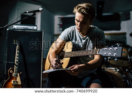 Similar – Image, Stock Photo Musician writing in a notebook