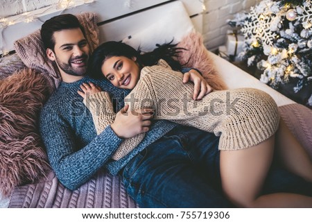 https://image.shutterstock.com/display_pic_with_logo/177219002/755719306/stock-photo-passionate-romantic-couple-spending-time-before-new-year-near-beautiful-christmas-tree-at-home-755719306.jpg
