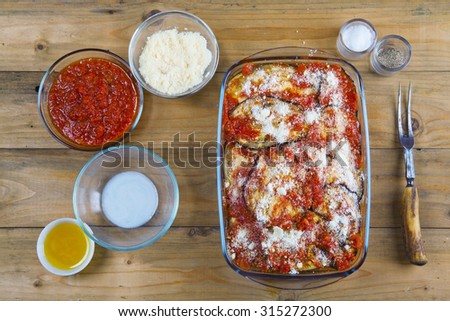 preparation of eggplant Parmesan. Italian vegetarian food. fried dish in the oven with cheese. typical traditional Mediterranean food
