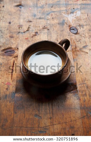 espresso coffee cup on a wooden texture table. copy space. menu. shop.