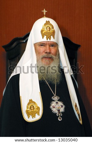 Patriarch Alexiy II, head of the Russian Orthodox Church, poses to photographers in his Moscow residence on March 14, 2004.