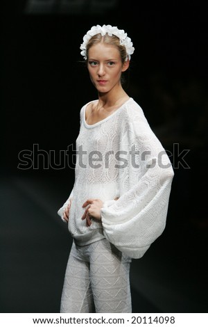 MOSCOW - OCTOBER 28: A model displays a creation by Russian designer Ludmila Norsoyan during Russian Fashion Week (RFW) October 28, 2008 in Moscow, Russia.