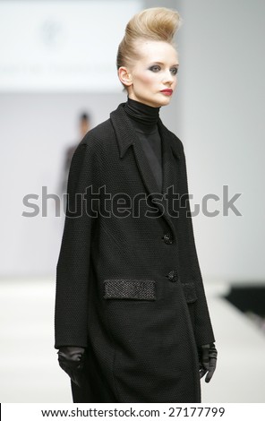 MOSCOW - MARCH 21: Model walks the runway during the Valentin Yudashkin Collection as part of Fashion Week, March 21, 2009 in Moscow, Russia.