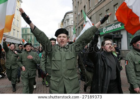 MOSCOW - MARCH 22: Russians celebrate St. Patrick\'s Day in central Moscow, Russia on March 22, 2009. St. Patrick is an annual event which celebrates Saint Patrick, one of the patron saints of Ireland.