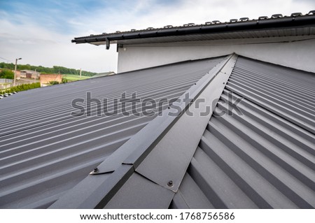 Similar – Image, Stock Photo House with metal facade in front of a blue sky with light veil clouds