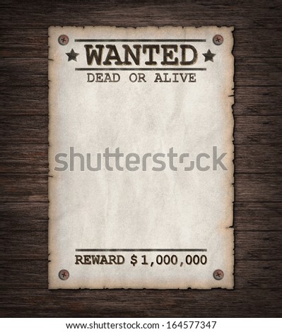 Torn Wild West wanted poster on old wooden wall