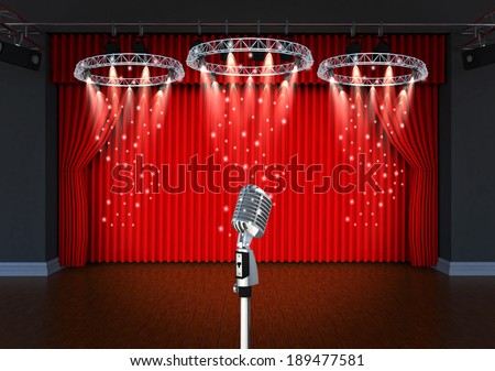 vintage microphone on Theater stage with red curtains and spotlights Theatrical scene in the light of searchlights, the interior of the old theater