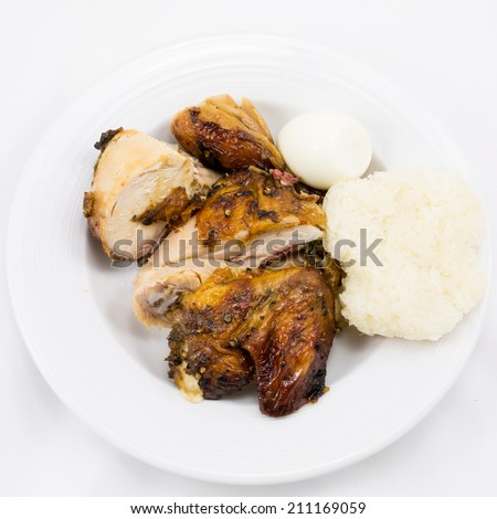 Hot Meat Dishes - Grilled Chicken Wings with sticky rice and egg.