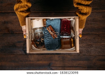 Care box, package ideas. Fall or Winter care box with sweets and warm clothes. Care Package Delivery, Fall Winter holidays Food Care gift box