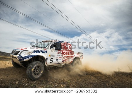 TERUEL, ARAGON/SPAIN - JULY 19: Polish Driver, Marek Dabrowski tries to get a good result in SS2 in Baja Aragon Rally on July 19, 2014 in Teruel
