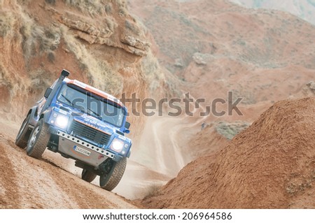 TERUEL, ARAGON/SPAIN - JULY 18: Spanish Driver, Jesus Enriquez tries to get a good result in Prologue in Baja Aragon Rally on July 18, 2014 in Teruel
