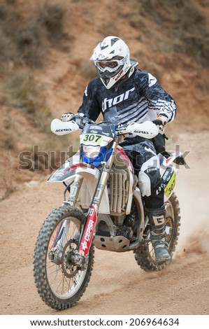 TERUEL, ARAGON/SPAIN - JULY 18: Spanish Rider, Nacho Casinos, tries to get a good result in Prologue in Baja Aragon Rally on July 18, 2014 in Teruel