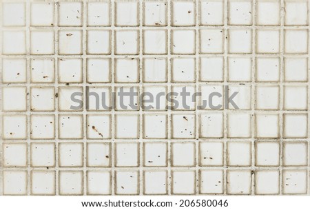 Old white square tiles texture for background.