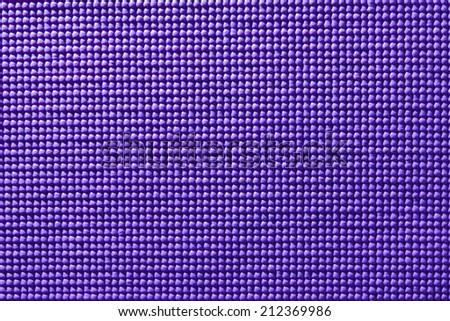 Abstract purple yoga mat texture background.