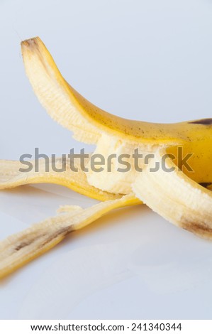 Close up of a open banana fruit isolated on white background