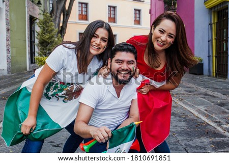 Mexican people with flag in mexican independence day in Mexico