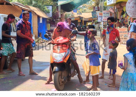 GOA, INDIA - MAR, 17: Unidentified people celebrating Holi in an Indian village, MAR 17, 2014 in Goa, India. Holi - festival of colors, marks the arrival of spring, being one of the biggest festivals.