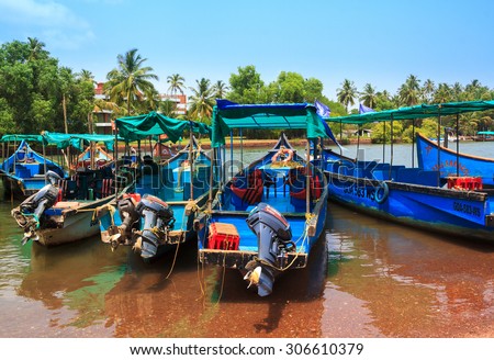 CANDOLIM, GOA, INDIA - 11 APR 2015: Sinquerim-Candolim Boat Owners Association in Goa, India. Boats are in the harbor.