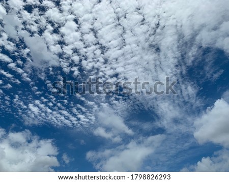 Cirrocumulus clouds are filled with beautiful streaks of clouds in the morning. Like small ripples a thin sheet of white ice crystals.no focus