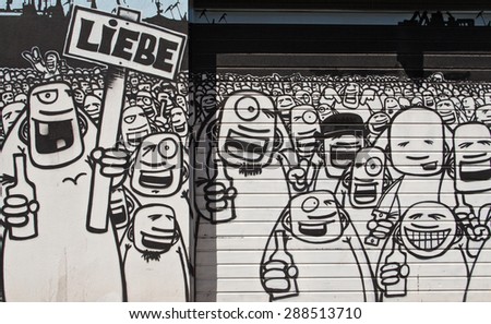 HAMBURG, GERMANY - JUNE 10, 2015: black and white graffiti by an unknown artist in Hamburg St Pauli