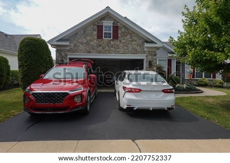 Similar – Image, Stock Photo 2 garages in front of a house wall