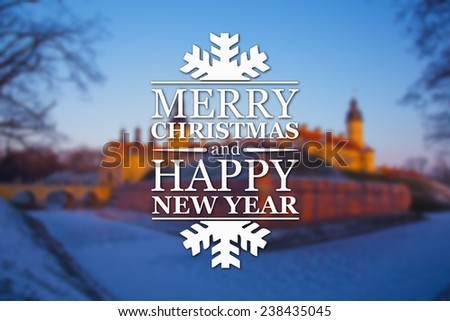 Merry Christmas and New Year greeting card on blurred old castle background