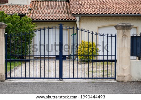 portal old blue classic metal home gate at entrance of house garden door Photo stock © 