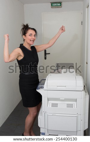 secretary using a copy machine