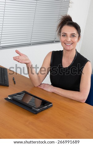Smiling HR woman having job interviews and receiving candidates