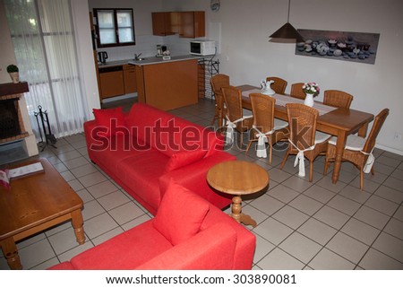 Modern, red sofa, clean, living room   in a  house