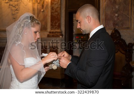 Bride and groom during church wedding ceremony